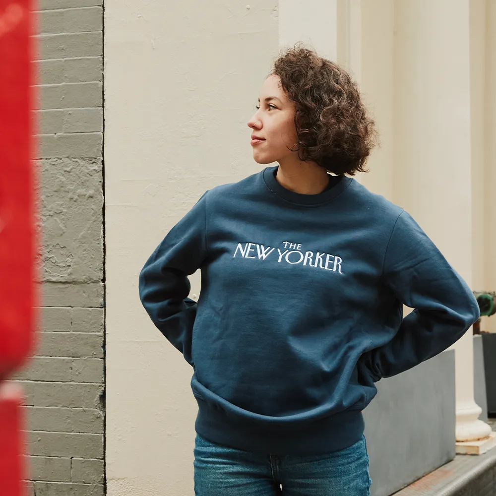 Rea Irvin’s Embroidered Crewneck Sweatshirt in Navy
