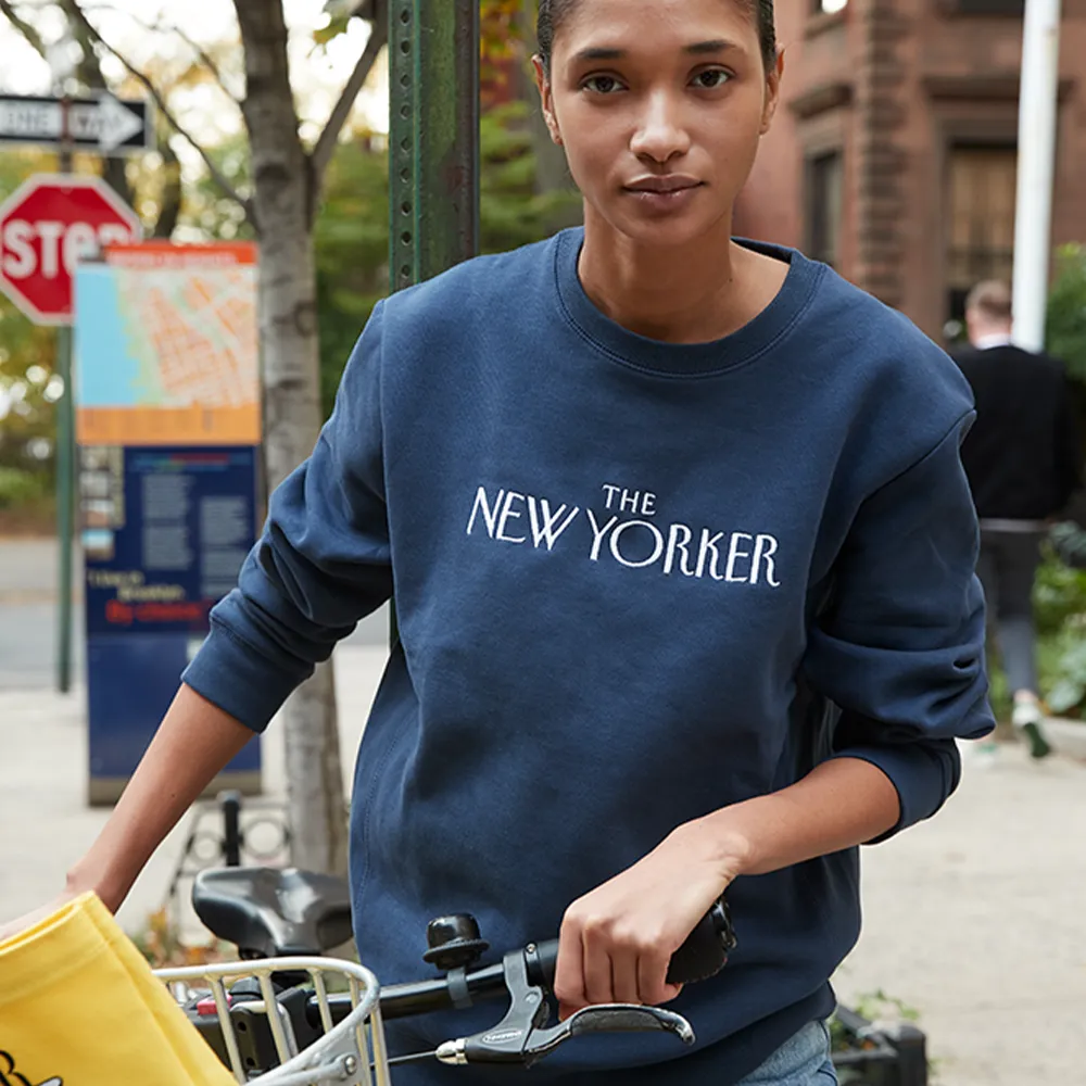 Rea Irvin’s Embroidered Crewneck Sweatshirt in Navy